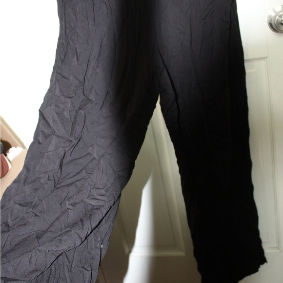 Torrid: Lace long sleeved jumpsuit with heart shaped neckline - Picture 4 of 10